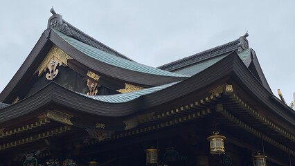 Detail of Japanese shrine architectures.  Plum floral as their “Kamon”(family crest), the...