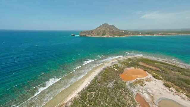 First-person Drone View Of Isla Cabra Surrounded By The Caribbean Sea In Montecristi, Dominican Republic. FPV aerial