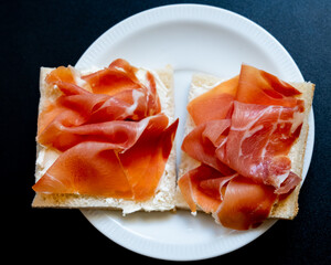 Sandwiches with sliced ham (hamon, jamon, prosciutto crudo)