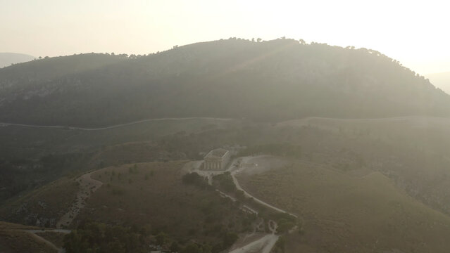 Aerial view of ancient temple standing on the high hill in Athens in Greece. Action. Temple of Olympian is also known as the Columns of the Olympian Zeus.