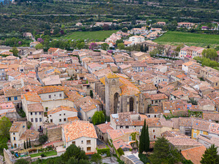 Fototapeta na wymiar Aerial view of Lagrasse medieval city, Aude, Occitanie. the city is built along the river Orbieu