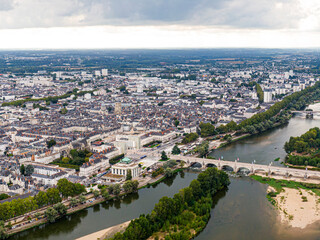 Fototapeta na wymiar Aerial view of Tours, Bridge Napoleon, bridge Wilson crossing the river Loire, Val-de-Loire, France