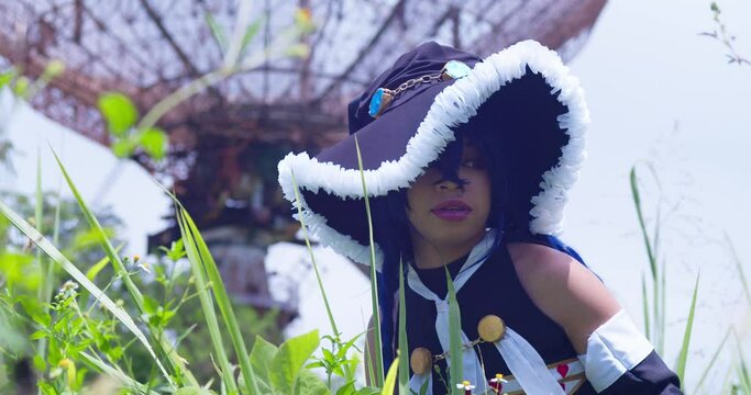 Wendy belserion cosplayer outdoors with a large radio station tower in the background