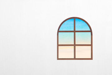 Traditional wooden window with sea view. empty white wall copy space for text.