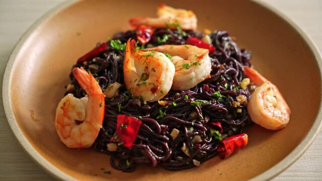 stir-fried black spaghetti with garlic and shrimps