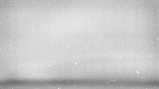 Animation of snow falling in seamless loop over grey background