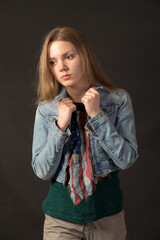 young girl on a black background