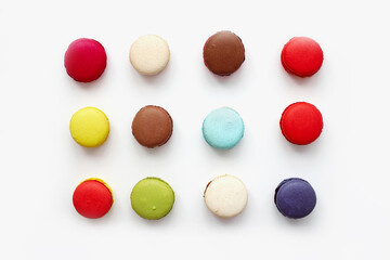 Colourful french macaroons or macaron on white background, Dessert. Isolated on white, top view, flat lay