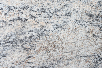 Natural white, gray, brown, and black marble stone texture background. Abstract granite rock tile surface backdrop wallpaper.