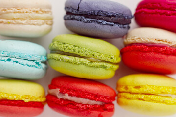 Colourful macaroons or macaron close up view, French dessert background