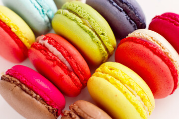 Colourful macaroons or macaron close up view, French dessert background