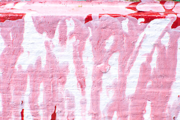 wooden background painted with red and white paint.