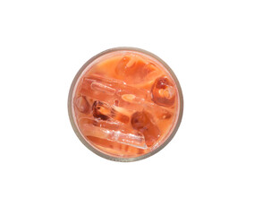 Top view of orange iced condensed Thai milk tea in transparent glass isolated on white background with clipping path