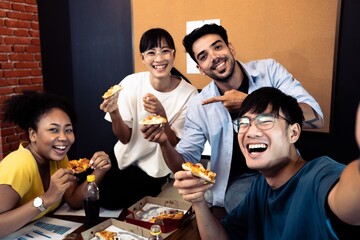 Diversity Group young friends eating pizza selfie by smart phone.People group multi ethnic African American Caucasian Asian working meeting together.Happiness party pizza and cola.focus on right man.