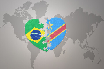 puzzle heart with the national flag of brazil and democratic republic of the congo on a world map background.Concept.