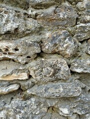 A wall lined with wild stone
