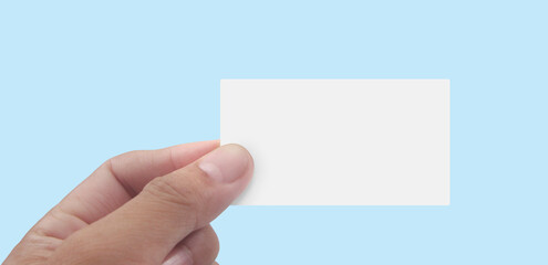 Fototapeta premium Close up of hand holding virtual card with. Credit card in hand