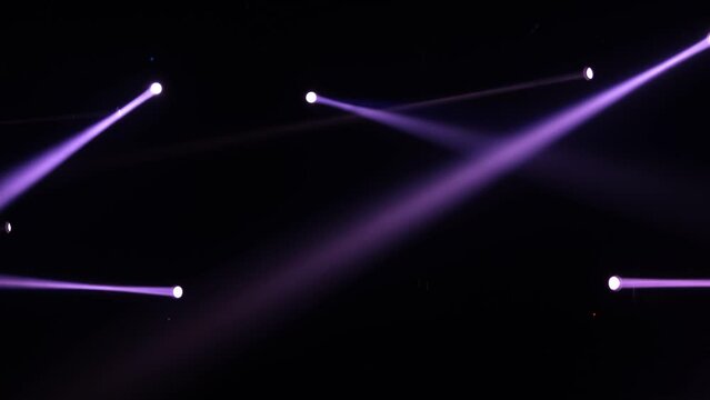Stage lighting beams spotlight and smoke of events show or concerts	