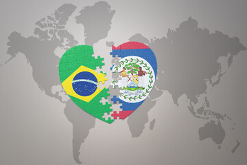 puzzle heart with the national flag of brazil and belize on a world map background.Concept.