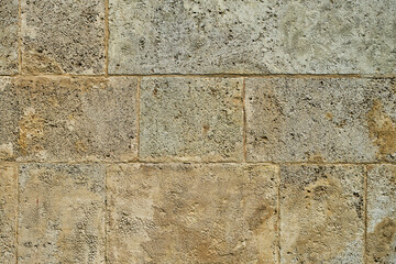 Background of old stone wall of sandstone house, interior decoration or design idea