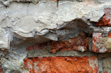 Texture of an old brick wall. Destroyed brick wall or fence