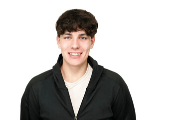Portrait of a happy teenager guy in sportswear on a white background, the guy is smiling, he is in a good mood and healthy looking. The concept of sports and health