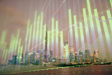 Forex chart on cityscape with tall buildings background multi exposure. Financial research concept.