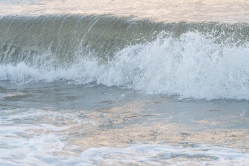 Waves crashing onto the beach