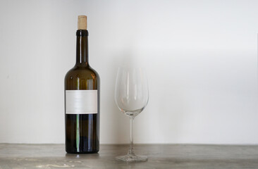 wine bottle and red wine glass with copyspace background