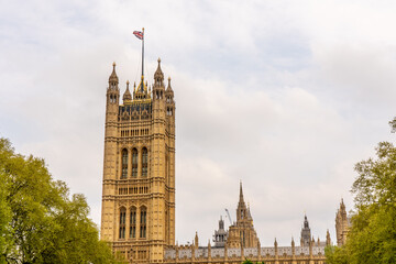 Fototapeta na wymiar View of Houses of Parliament in London on the banks of the Thames. High quality photo