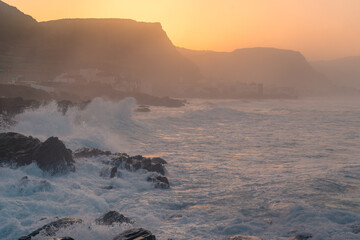 Seascape with big waves in Quintanilla at sunset. Arucas. Gran Canaria	