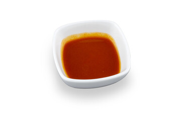 Tomato sauce in a small cup isolated on white