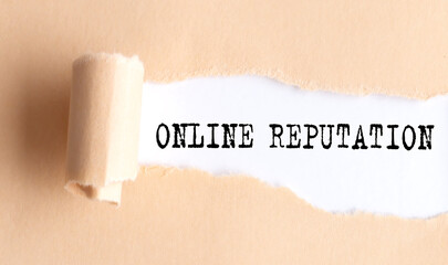 The text ONLINE REPUTATION appears on torn paper on white background.