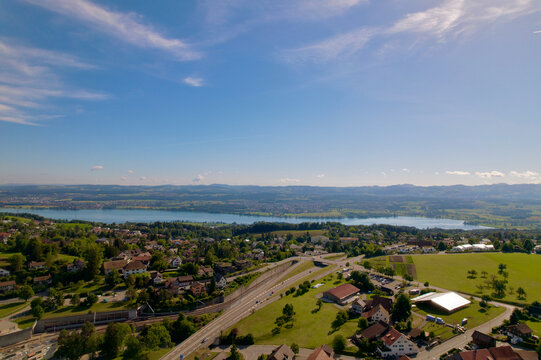 Aerial view over Lake Greifensee Canton Z&uuml;rich, with scenic rural landscape on a blue cloudy summer day. Photo taken June 8th, 2022, Forch, Switzerland.