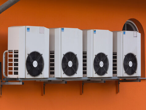 Wall mounted outdoor air conditioners for cooling rooms