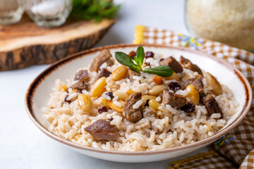 Traditional delicious Turkish food; rice pilaf with pine nuts and currants (Turkish name; bademli ic pilav or pilaf)