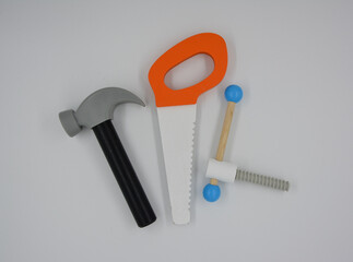 hammer, saw and a drill