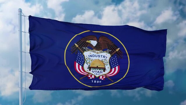Utah flag waving in the wind, blue sky background