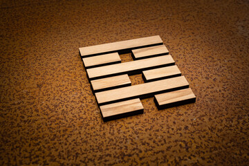 wooden Gene Key 64 i ging hexagram on rusty metal background human design