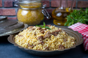 From traditional delicious Turkish cuisine; Bulgur pilaf with meat (Turkish name; etli bulgur pilavi)
