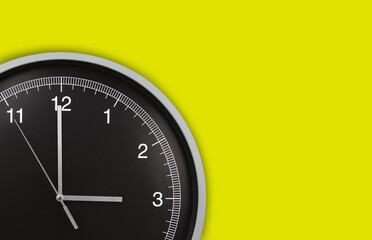 Wall clock showing three o'clock on yellow background. Copy space