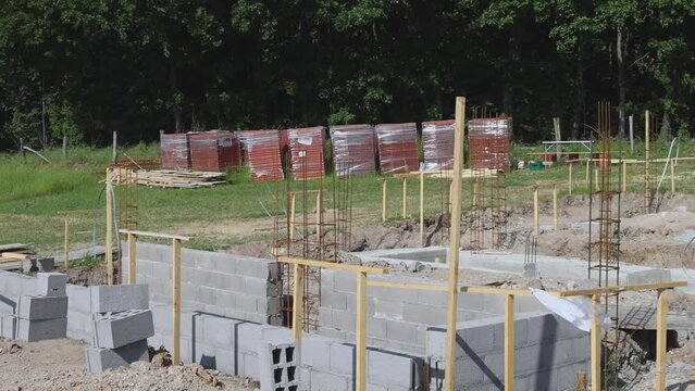 Building New Home House Foundation Concrete Blocks Construction Site tilt down