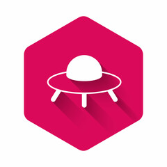 White UFO flying spaceship icon isolated with long shadow background. Flying saucer. Alien space ship. Futuristic unknown flying object. Pink hexagon button. Vector