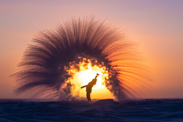 Person in full winter clothing throws a pitcher of boiling water into the air, creating rapid freezing at arctic temperature.