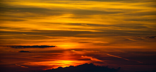 colorful sunset illuminating the sky yellow and red