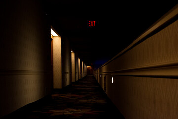 Creepy dark corridos with exit sign