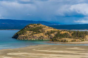 Landscape, road trip scenes in Yukon Territory, during fall, autumn. Canadian travel, tourism. 