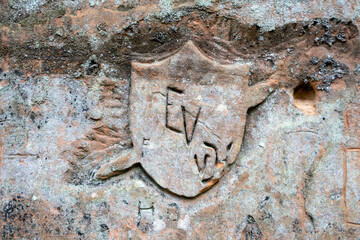 A symbol engraved on the rock. Sandstone cliffs is approximately one kilometre long and is located on the left side of the primeval valley of the River Gauja. Latvia