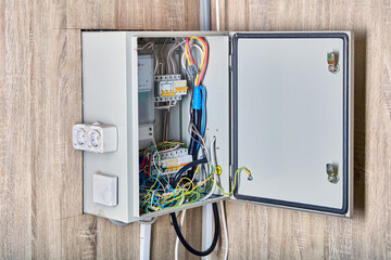 Power supply box with fuses and electric meter.