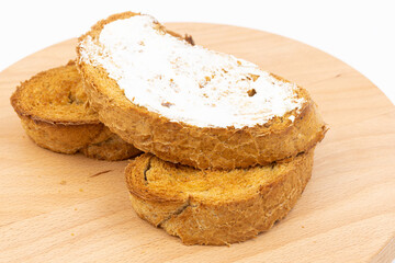 Baked bread with olive oil on the baking pan